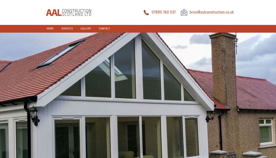 AAL Construction website on a computer